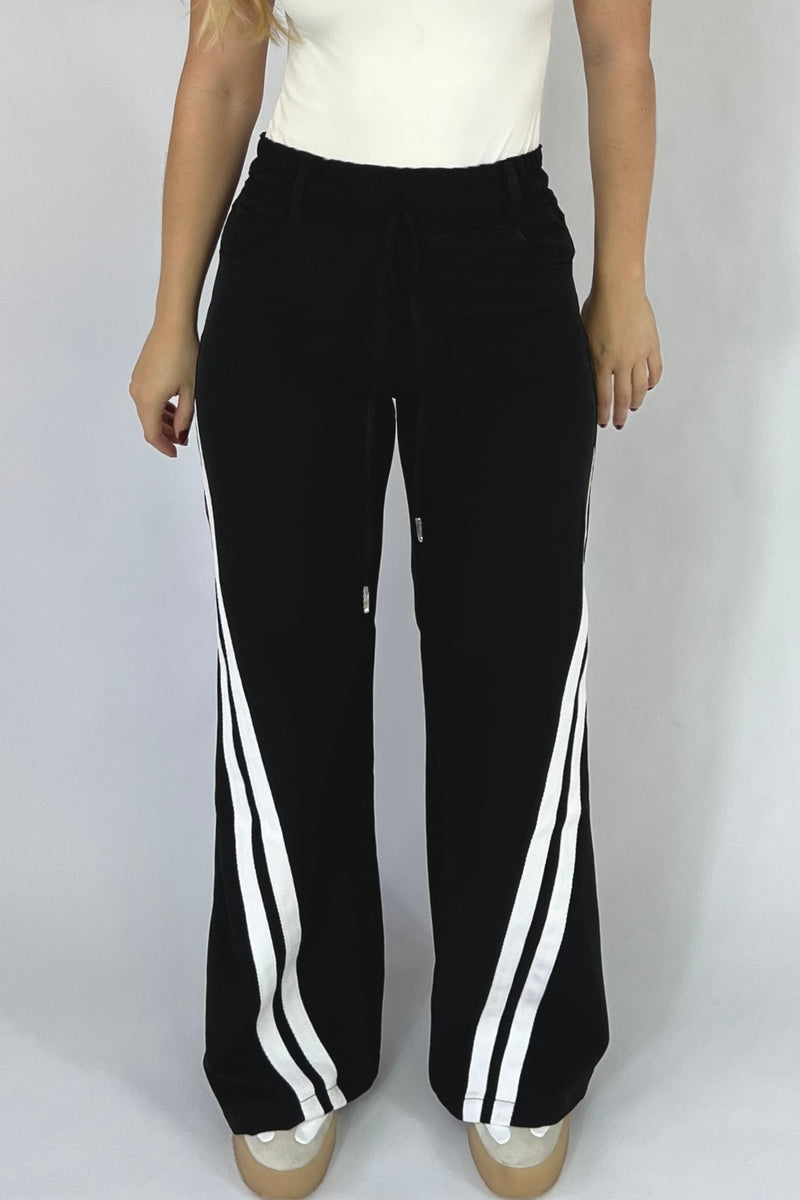 PANTALON NEGRO RAYAS BLANCAS REF: 295