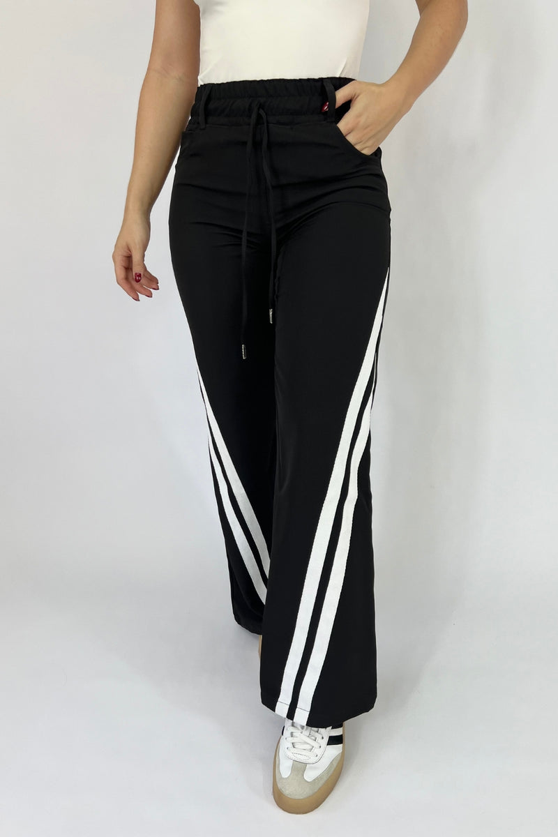 PANTALON NEGRO RAYAS BLANCAS REF: 295