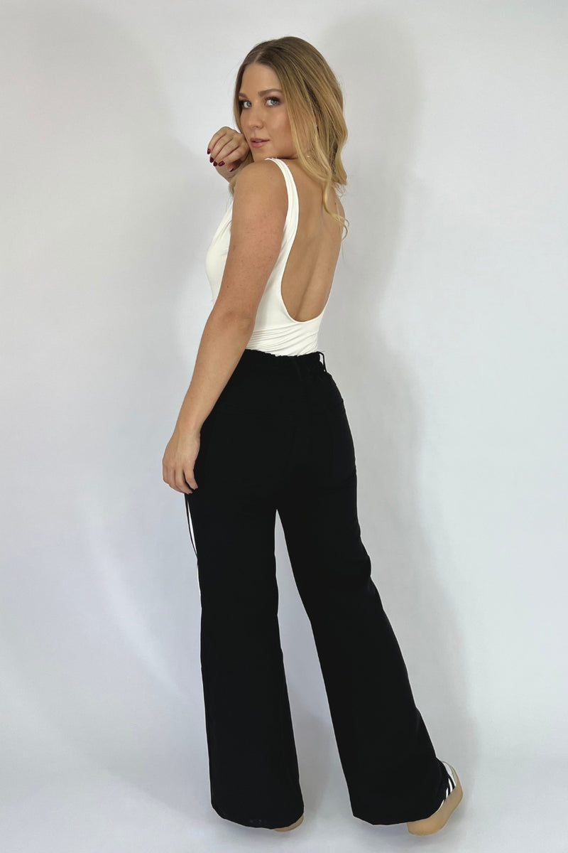 PANTALON NEGRO RAYAS BLANCAS REF: 295